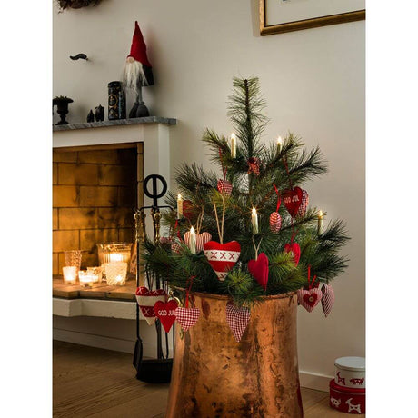 LED Tree lighting 5 candles add-on set for 1901-100 warm white battery-operated on a decorated Christmas tree.