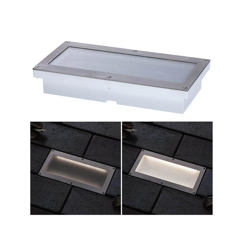 LED Bodeneinbauleuchte Brick mit Bewegungsmelder IP67 in Metall/Edelstahl, zeigt leuchtende Fläche in der Dämmerung.