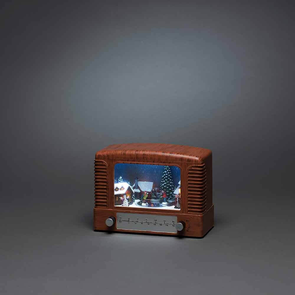 LED Dekoleuchte im Retro-Radiodesign mit Weihnachtsmotiv und Musikfunktion, batteriebetrieben.