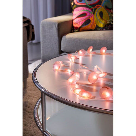LED Decorative light string with mother-of-pearl petals, 20 warm white LEDs, battery-operated, decorated on a table