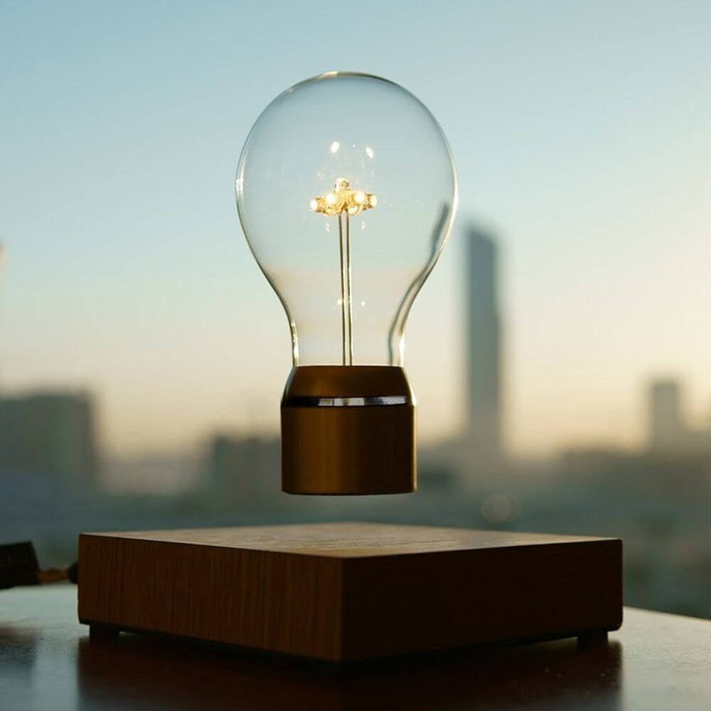 LED-Dekotischleuchte schwebende Glühbirne mit elegantem Design und schwebender Glühbirne in Borosilikatglas.