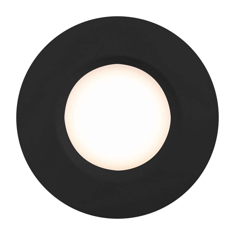 LED Einbaustrahler Tiaki IP65 in schwarzem Design mit runder Form und warmem Licht.