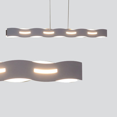 LED Suspension Wave Nickel – Suspension moderne avec de douces ondulations et une lumière blanc chaud.