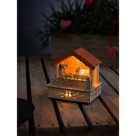 LED Holzsilhouette naturfarben Marktstand mit orangem Dach 3 Warmweiße Dioden batteriebetrieben in stimmungsvoller Beleuchtung.