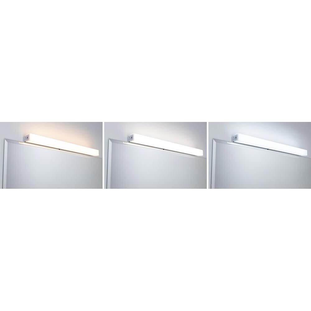 LED HomeSpa Bad- & Spiegelleuchte Luno Weiß in verschiedenen Lichtfarben über einem Spiegel montiert.