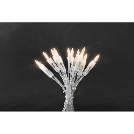 LED Mini string lights with 35 warm white diodes on a black background, sparkling in a festive mood.