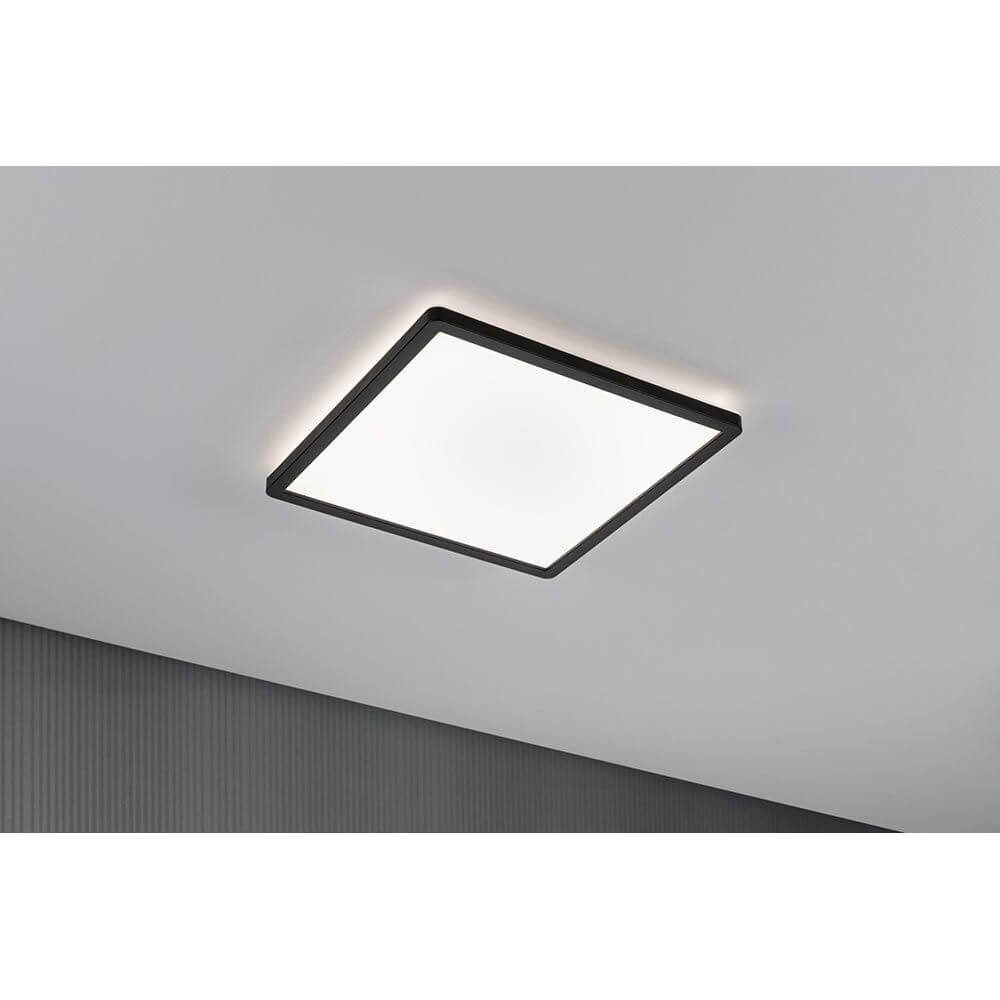 LED Decken & Wand Panel Atria Shine 4000K Schwarz in quadratischem Design mit warmweißer Beleuchtung.