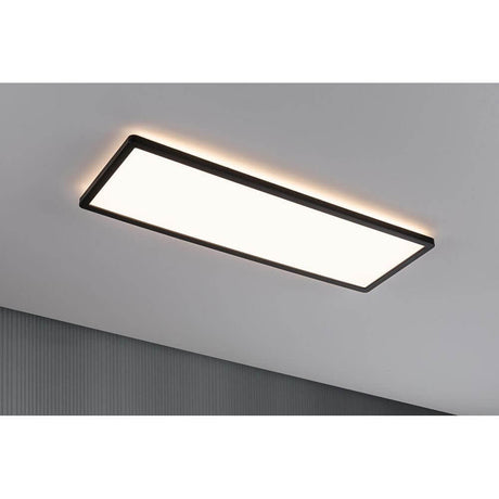 LED Panel Atria Shine 3-step dimmer black rectangular installed on the ceiling, warm white lighting.