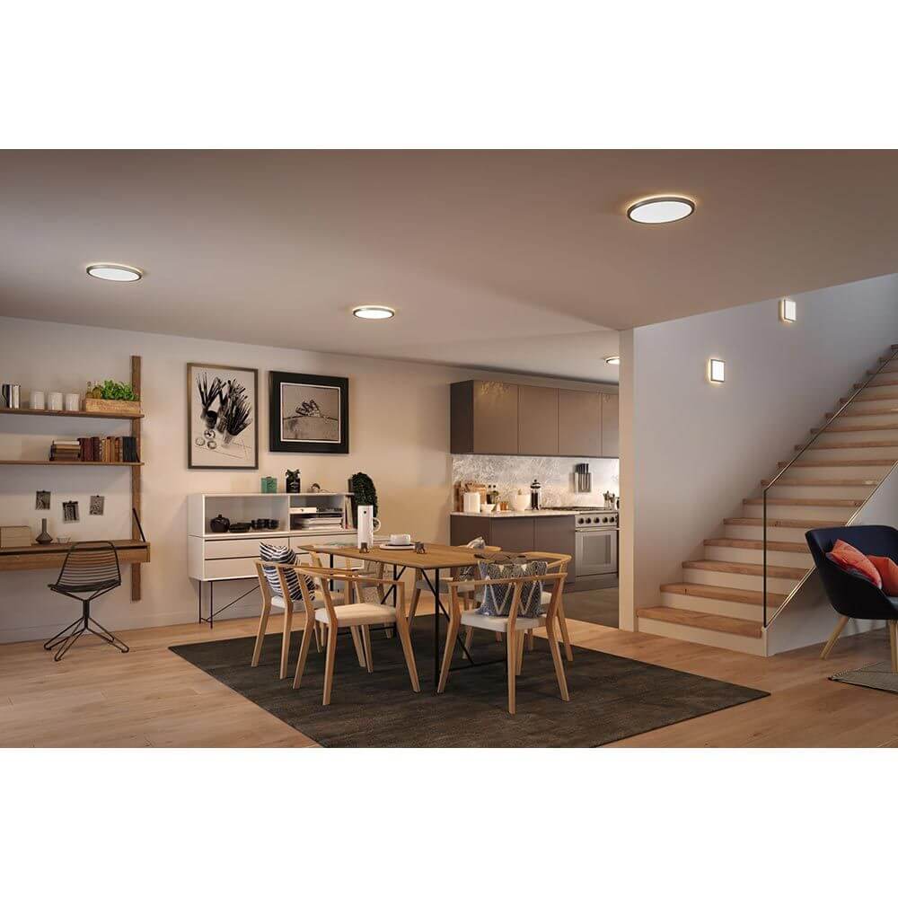 LED Decken-Panel Atria Shine Ø 29cm Rund Chrom in modernem Wohnraum mit Essbereich und Küche.