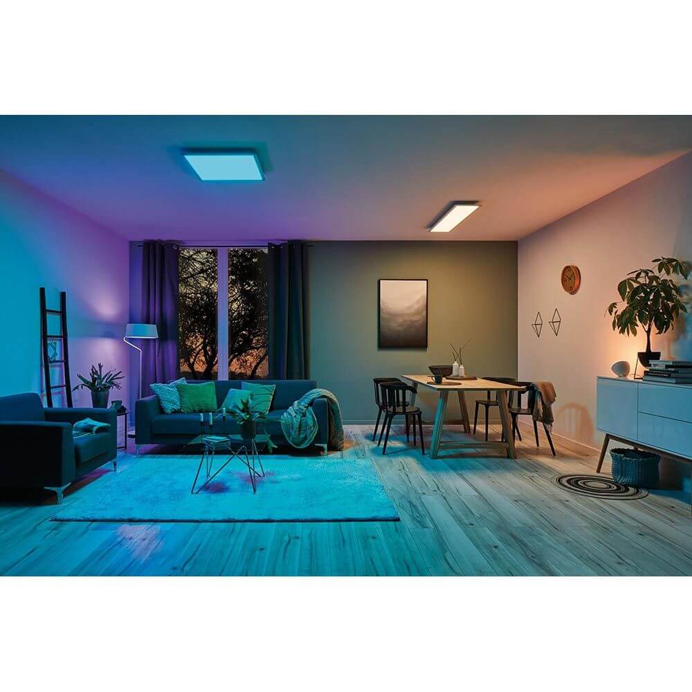 LED Panel Smart Home Zigbee Amaris RGBW Eckig in modernen Wohnraum mit farbigen Lichteffekten.