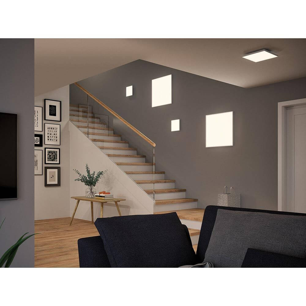 LED Panel Smart Home Zigbee Velora Quadratisch Weiß-Matt in einem modernen Treppenhaus mit satiniertem Licht.