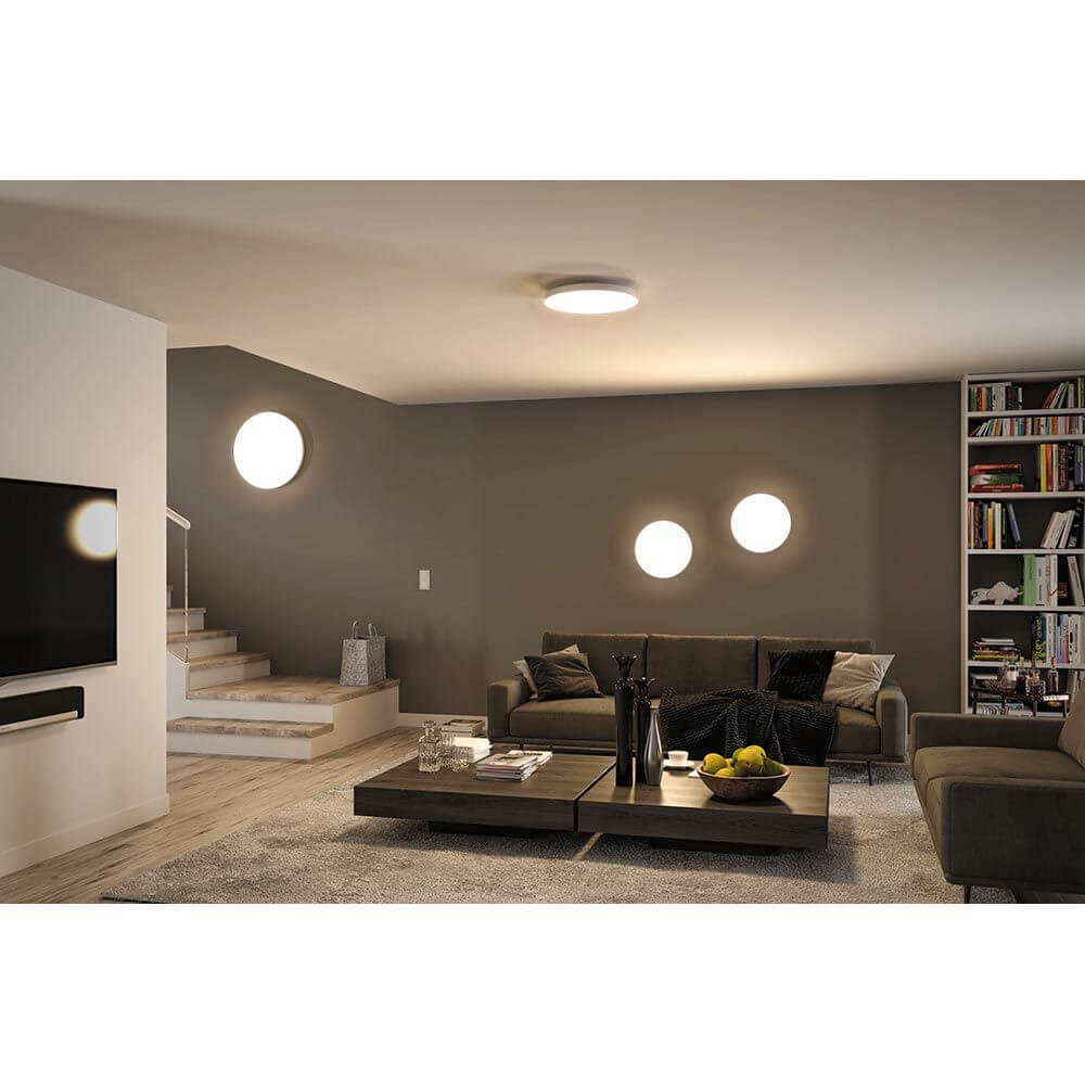 LED Panel Smart Home Zigbee Velora CCT Rund 40cm Weiß in modernem Wohnzimmer mit Decken- und Wandmontage.