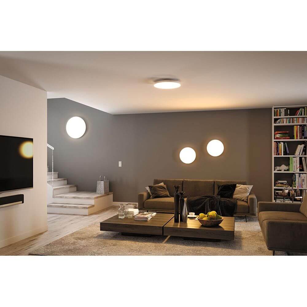 LED Panel Smart Home Zigbee Velora CCT Rund 40cm Weiß im modernen Wohnzimmer mit Decken- und Wandmontage.