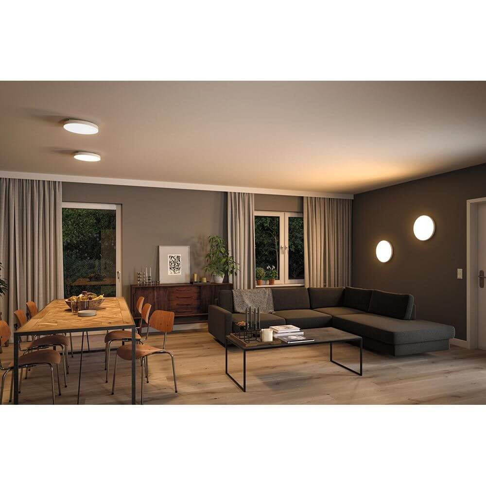 LED Panel Deckenleuchte Velora Ø 30cm in modernem Wohnraum mit Tageslicht.