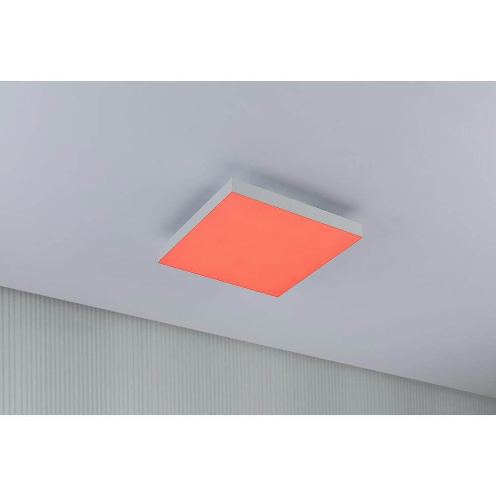 LED Panel Velora Rainbow CCT-Dimmbar 29x29cm in rotem Licht, sorgt für dynamische Raumbeleuchtung.