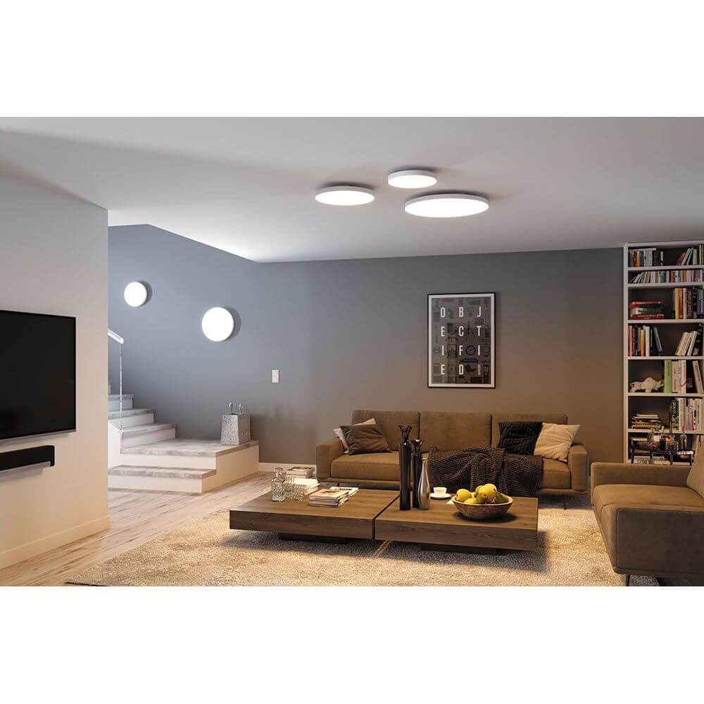 LED Panel Velora 60cm Wärme-Dimmbar Weiß installiert in modernem Wohnzimmer mit stilvollem Design.