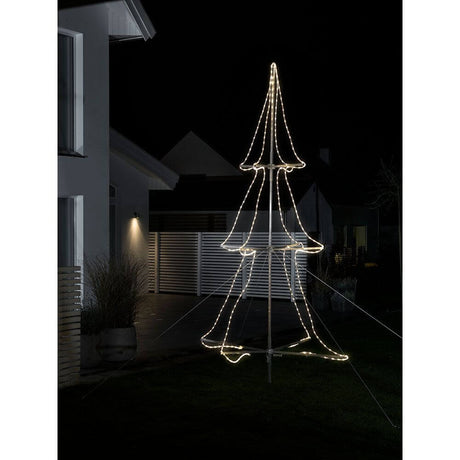 LED Schlauchsilhoutte Tannenbaum 3D klein 216 Warmweiße Dioden IP44 leuchtet im Garten bei Nacht.