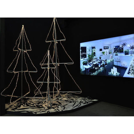 LED Schlauchsilhoutte Tannenbaum 3D klein 216 Warmweiße Dioden IP44 in festlicher Weihnachtsdekoration.