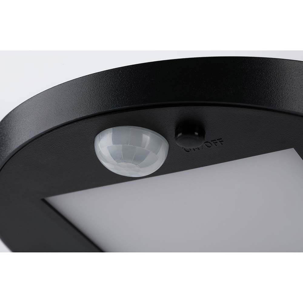 Detailansicht der LED Solar Wandleuchte Ryse mit Sensor, anthrazit, Schalter und Bewegungssensor.