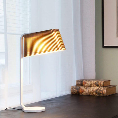 LED Owalo 7020 table lamp made of wood, 50 cm, with modern design and wooden shade on a table.