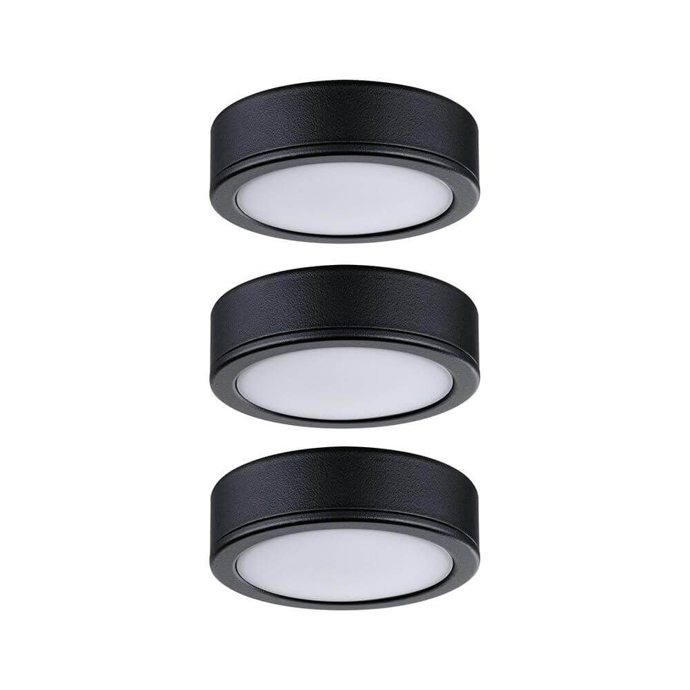 Schwarze LED Unterschrankleuchten Pukk Rund 6,5 cm im 3er-Set für Möbelbeleuchtung und effektvolle Akzente.