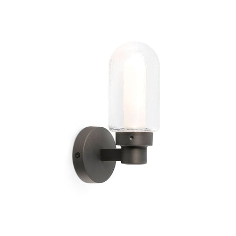 LED Wandleuchte BRUME 3W 2700K IP44 Bronze an der Wand mit Glasabdeckung und bronze-farbenem Gestell.