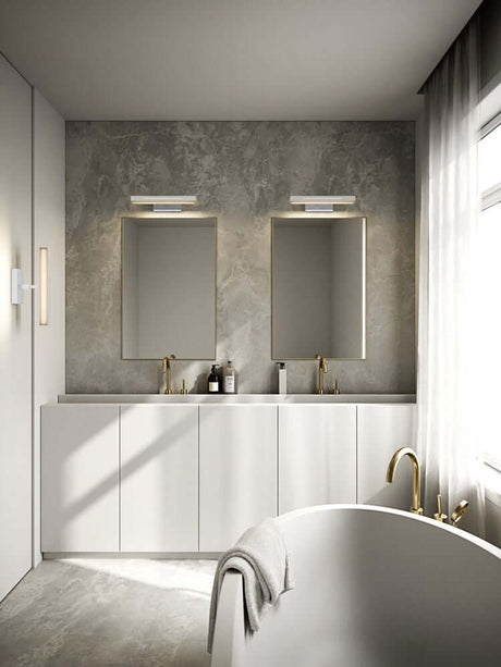 LED Wandleuchte Otis 40 IP44 im modernen Badezimmer über dem Spiegel, vertikal und horizontal montierbar