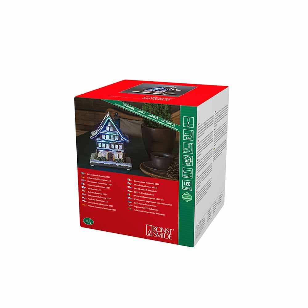 Verpackung des LED Winterhaus batteriebetrieben & 3 mehrfarbigen Leuchtdioden mit buntem Design und Informationen.