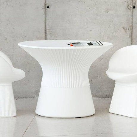 Capri table with LED solar lighting and remote control in modern design with two white chairs.