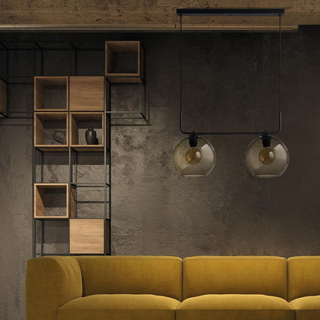 Pendant light Monaco in retro look black above yellow sofa in modern interior with wooden shelves