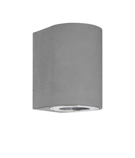 L’applique extérieure Lido H 12 cm GU10 Down IP65, luminaire extérieur moderne en béton et verre de couleur grise.
