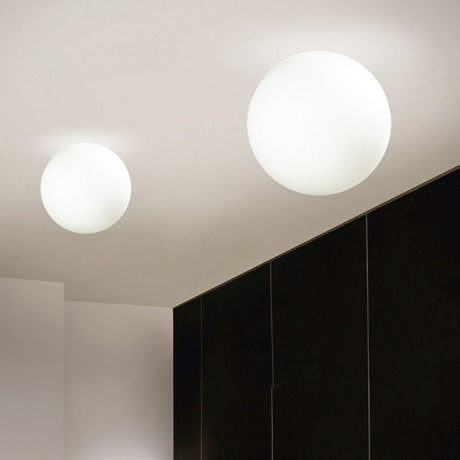 Oh! S ceiling light in two round, white designs mounted on the ceiling.