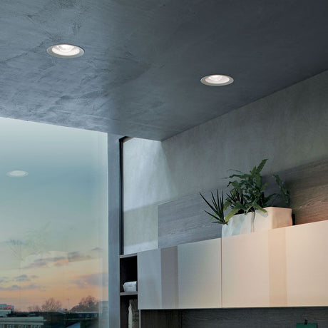 Lighting with Outlook C LED recessed spotlight in a modern room, ceiling lighting and plants.