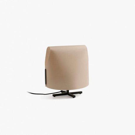 Luang table lamp with a minimalist structure and a natural-coloured lampshade on a black base.