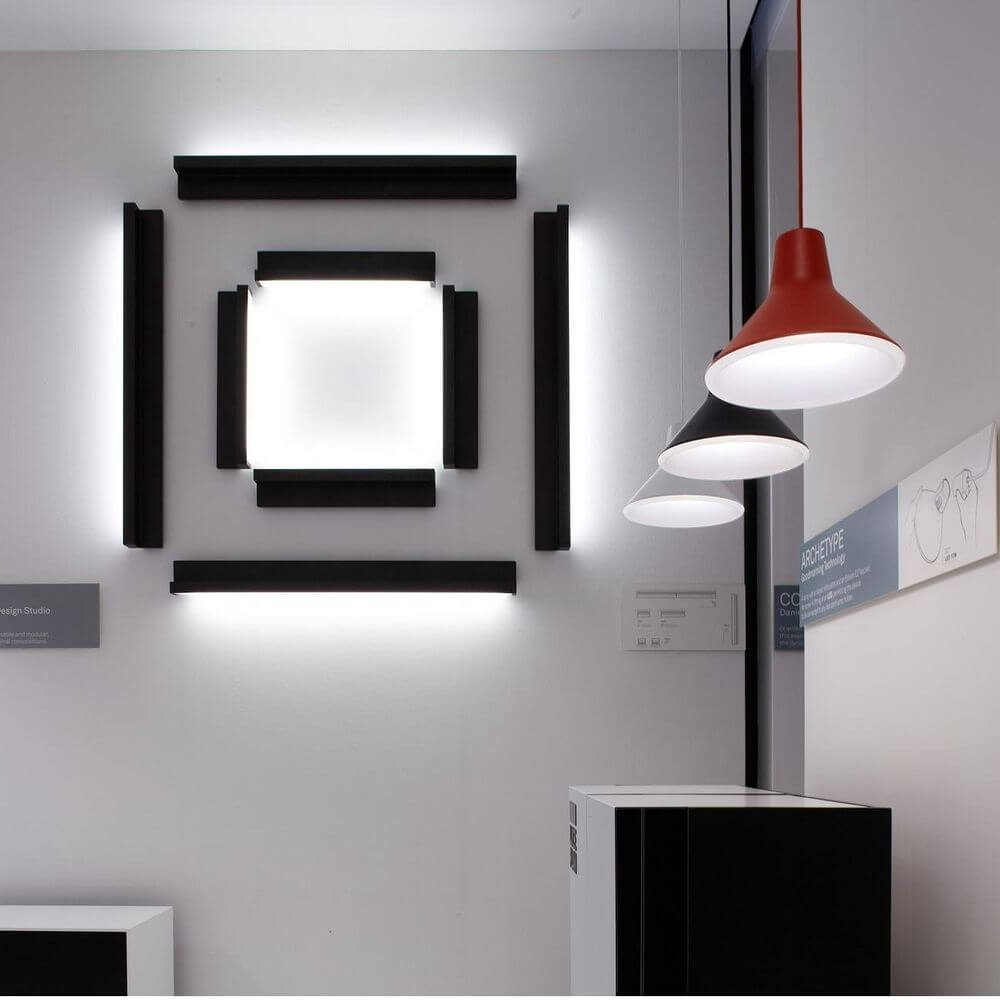Luceplan Archetype Retro LED Pendelleuchte 10W 2700K in modernem Innenraum mit geometrischen Lichtakzenten.