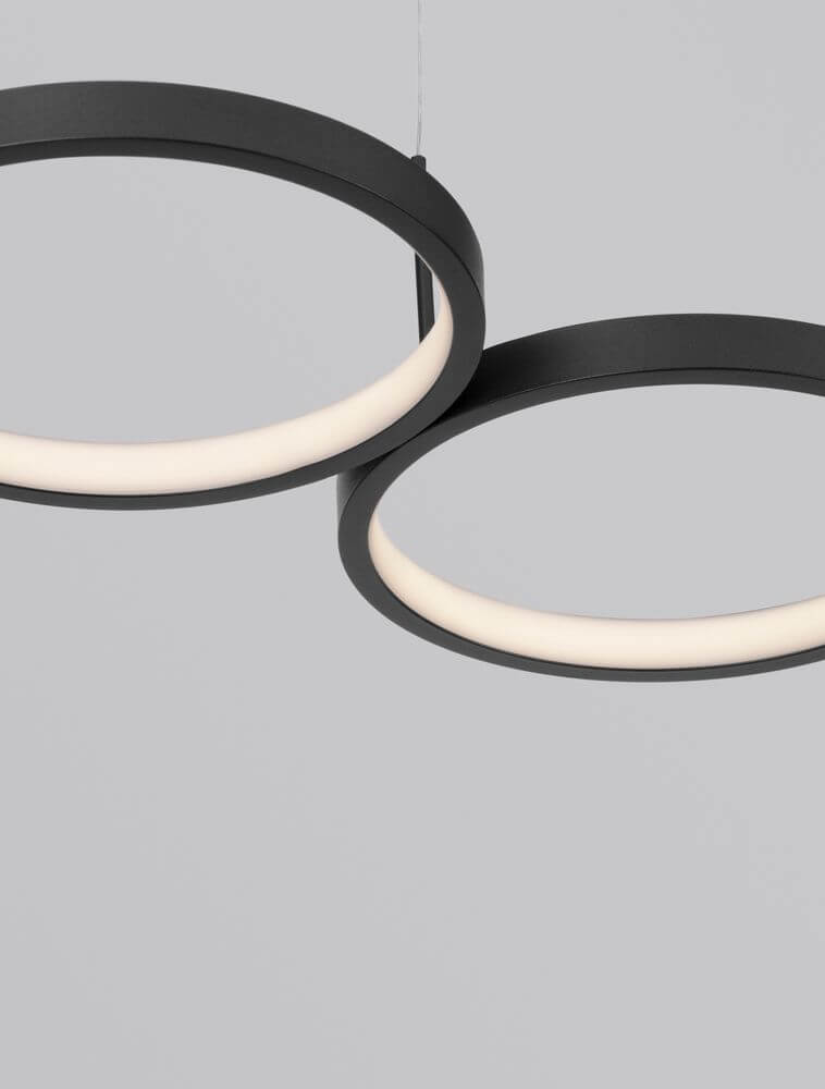 Magnus LED Pendelleuchte 4-flammig 3000K mit modernem Design aus zwei runden Leuchtelementen.