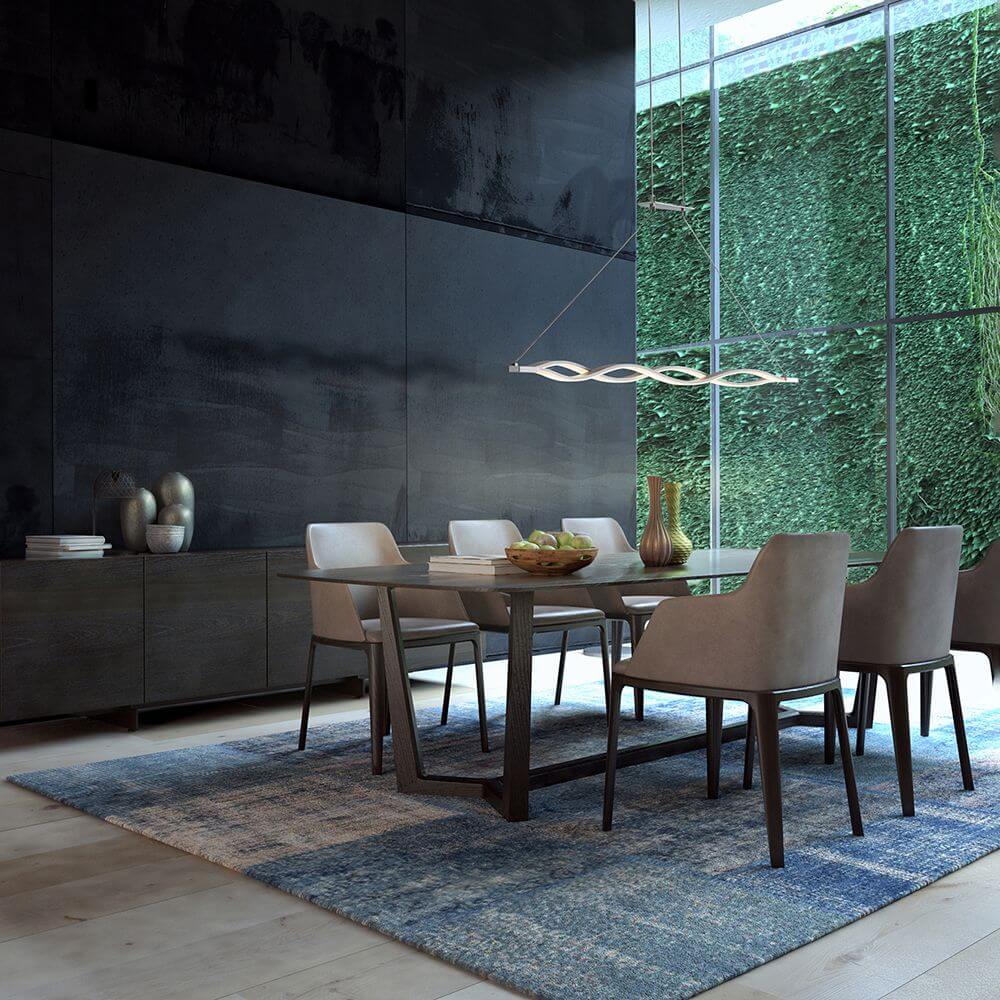 LED-Pendellampe Sahara 36W über modernem Esstisch in stilvollem Ambiente mit grünem Wanddesign.
