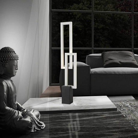 LED-Vægmaleri bordlampe i mat hvid i en moderne levende atmosfære med en Buddha statuette.