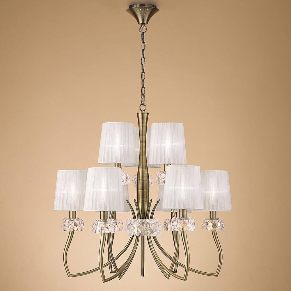Loewe 9-flammige Pendellampe mit modernem Design und runder Form, Metall- und Glaselementen.