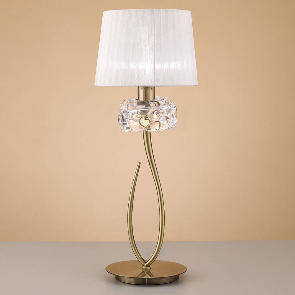 Loewe Tischleuchte Groß mit elegantem Design, runder Form und Materialien aus Metall und Glas.