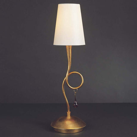 Paola table lamp in a modern design with a gold metal base and a white lampshade.
