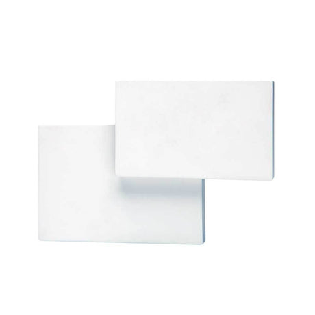 Tahiti White-Matt rectangular LED wall light in a restructured design, ideal for stylish living spaces.