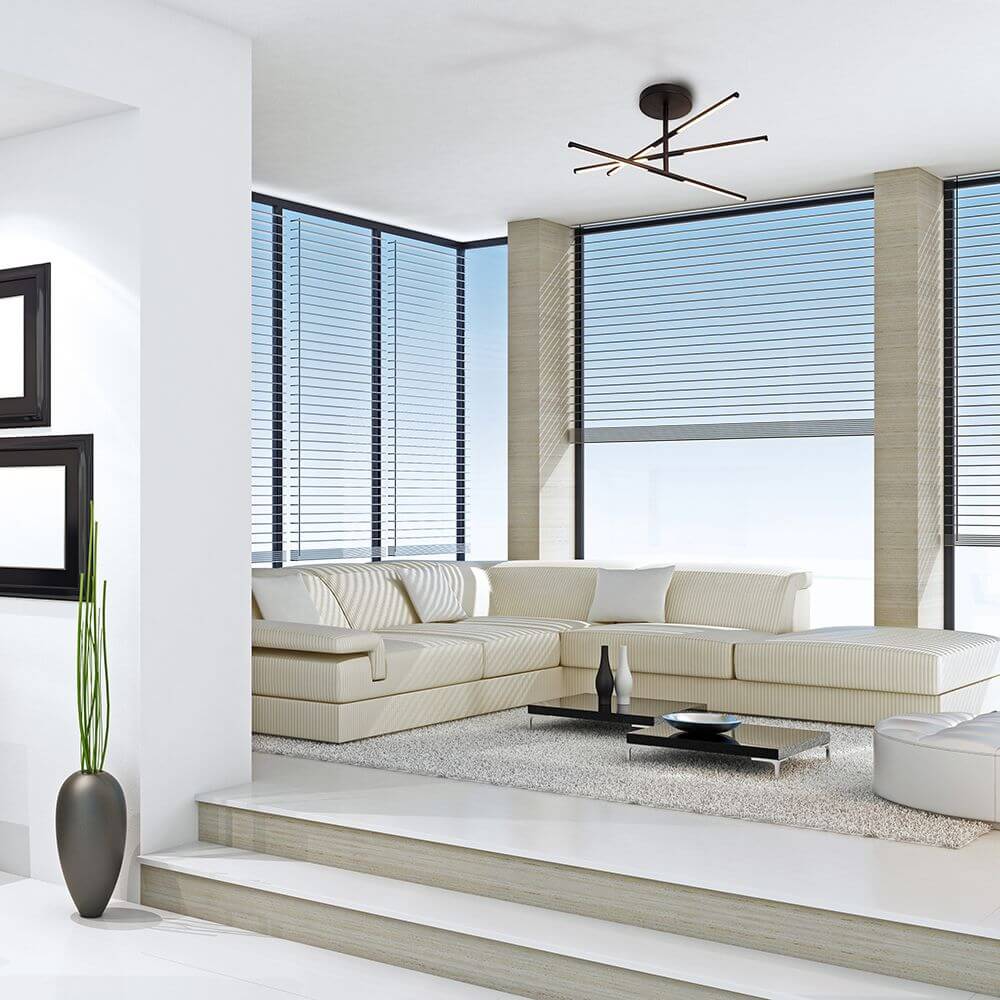 Moderne Wohnung mit Torch LED-Deckenlampe, stilvolles Ambiente mit runden Formen und hochwertigen Materialien.