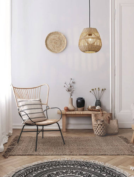 Marlo pendant light Pear Beige Rattan above a cozy living area with natural décor.