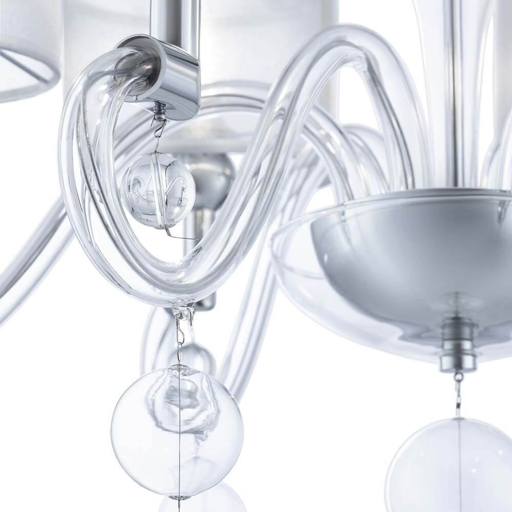 Kronleuchter Bubble Dreams mit transparentem Glasrahmen und glänzendem Metall. Elegante Lichtakzente setzen.
