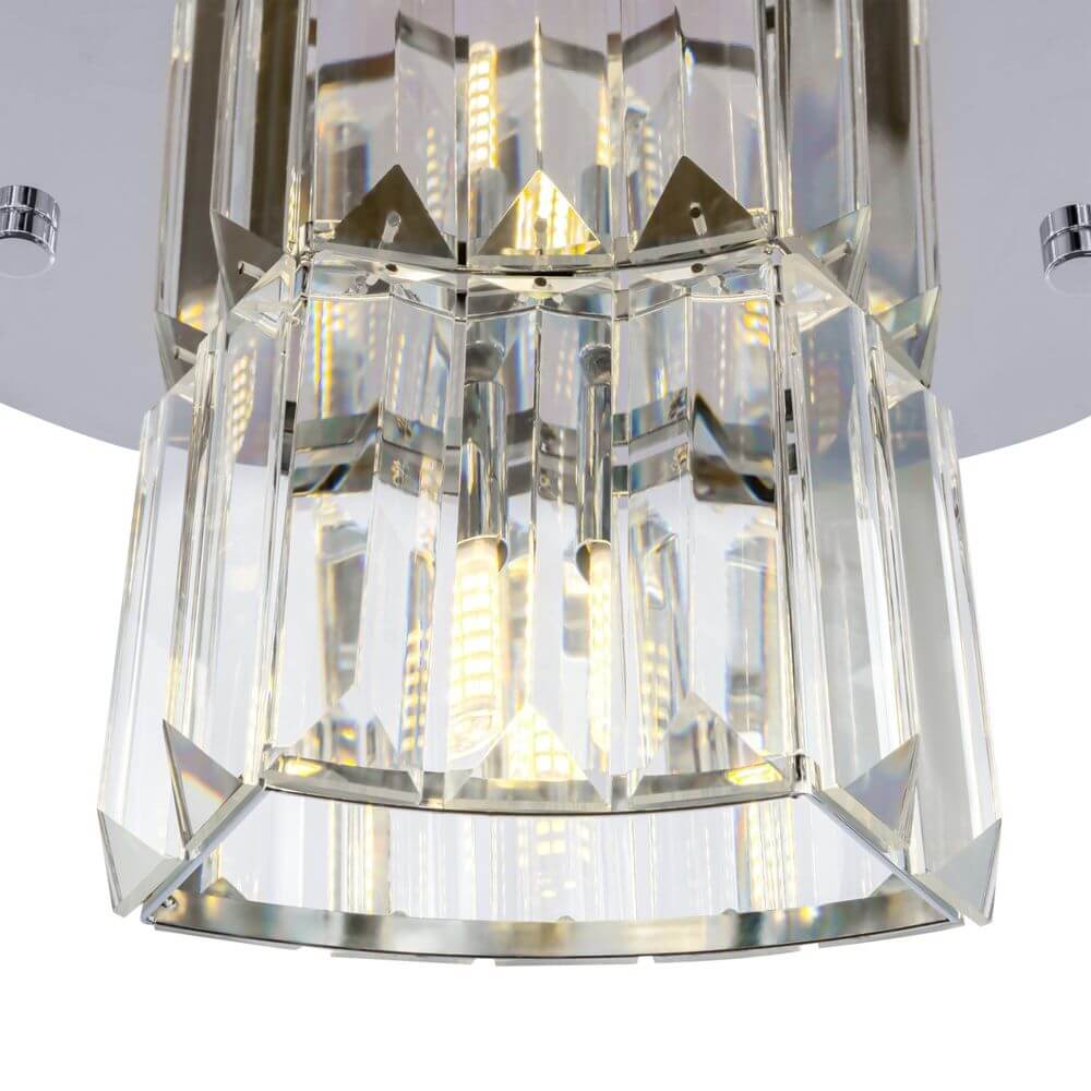 Colline Glas-Pendelleuchte 4-flammig mit asymmetrischem Design und glanzpolierten Glaselementen.
