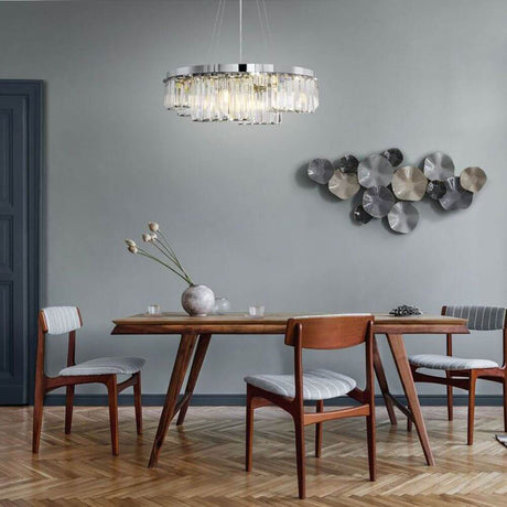Colline Glas-Pendelleuchte im Asymmetrischen Design über einem modernen Esstisch in stilvollem Raum.