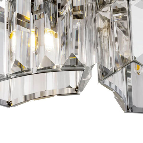 Glas Wandlampe Colline 2-flammig mit asymmetrischem Design und glanzpolierten Glaselementen.
