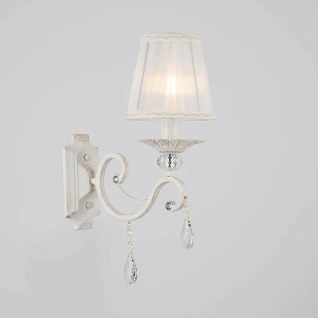 Grace wall light White with white lampshade and crystal pendant in an elegant design.