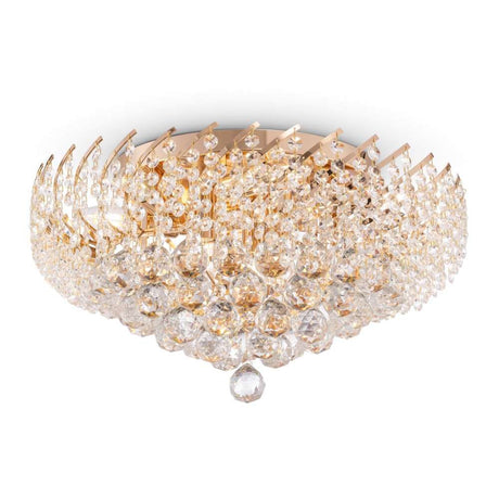 Karolina ceiling light with gold-plated metal frame and crystal pendants in various sizes.